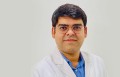 Dr. Karan Midha